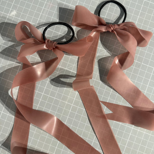 Translucent Pink Latex Bows