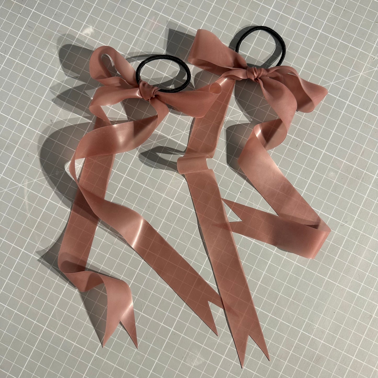 Translucent Pink Latex Bows